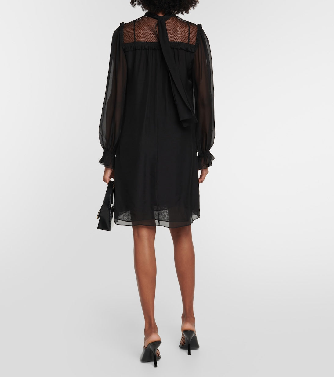 DOROTHEE SCHUMACHER
Lace-trimmed ruffled silk minidress